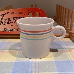 Fiestaware mug with 4 retired color stripes on it. Perfect condition. Excellent